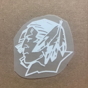 May include: White vinyl sticker of a Native American man's profile with feathers in his hair.