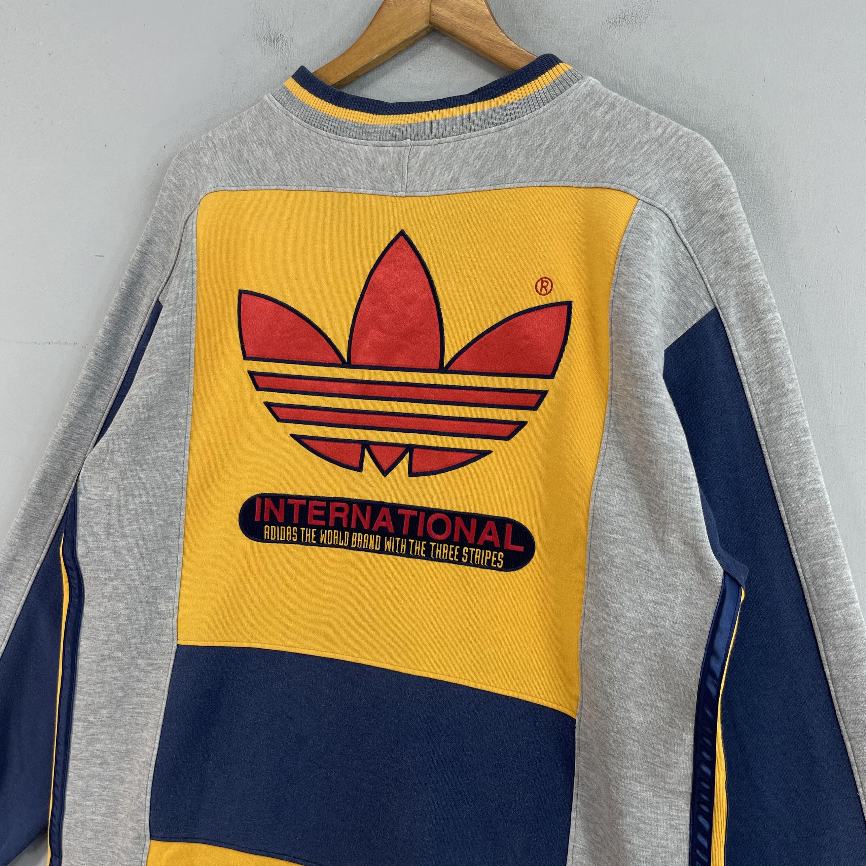 Adidas originals authentic three stripe high neck sweatshirt in yellow hotsell