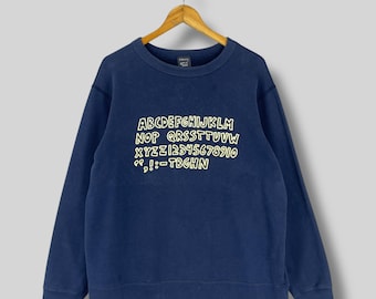 Sudadera vintage de cuello redondo de Keith Haring, talla XL, años 2000, con ilustraciones numéricas y del alfabeto pop art de Keith Haring, grafiti, suéter azul de K. Haring, talla XL