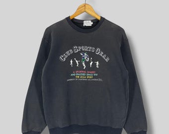 Sudadera vintage de cuello redondo de la UCLA de los años 90, talla mediana, con bordado de la Universidad de California en Los Ángeles, color negro descolorido, talla M