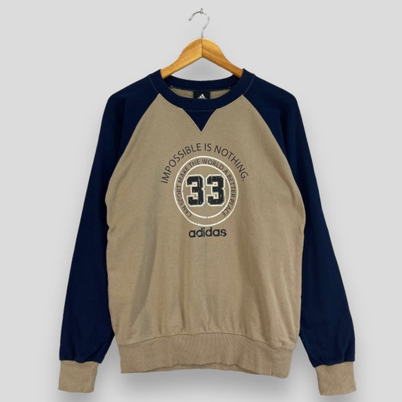 the brand with the three stripes sweatshirt