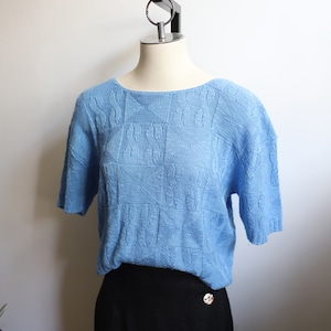 Vintage 1970er 80er Jahre hellblaue Kurzarm-Strickpulloverbluse