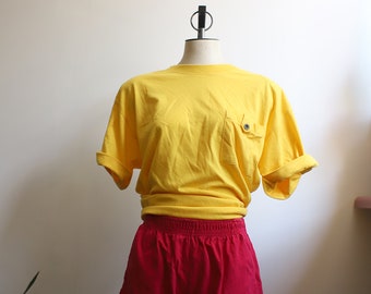 Vintage Ashleigh Morgan large minimalist 1980s 90s yellow pocket tee t-shirt
