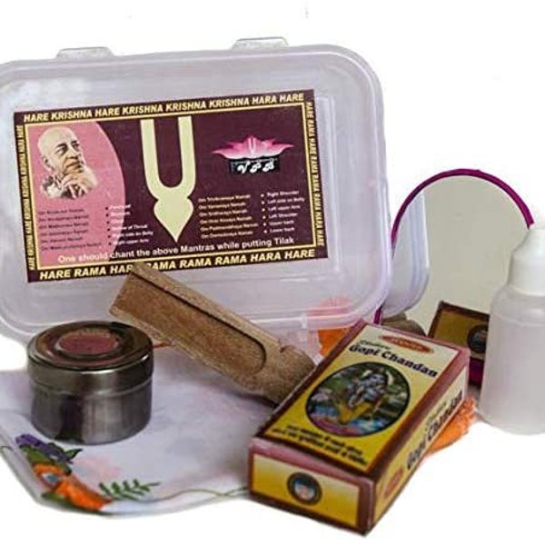 The travel set includes gopi chandan, tilak stamp, mirror, bottle for water, some box (Dibbi) and handkerchief.
