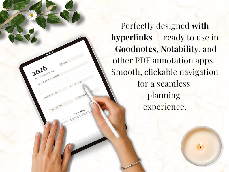 May include: A digital planner on a tablet, featuring a 2026 New Year's resolutions layout. The screen displays sections for goals, priorities, and things to try. Text on the screen reads "Perfectly designed with hyperlinks". A white stylus is held over the screen.