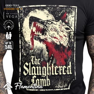 May include: Black t-shirt featuring a vintage-style graphic of a wolf howling at the moon. The graphic includes the text "The Slaughtered Lamb" and "Flamentina".