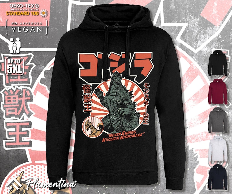 May include: Black hoodie featuring a graphic print of Godzilla in a vintage Japanese style. The text on the print reads "Monster King" and "Never Ending Nuclear Nightmare".