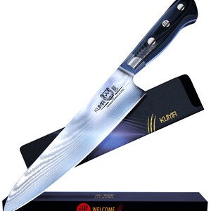 May include: A black and silver kitchen knife with a black handle and a tiger logo on the blade. The knife is in a black box with the word "WELCOME" printed on it.
