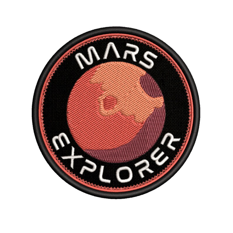 May include: A black and white embroidered patch with a red planet and the text "MARS EXPLORER".