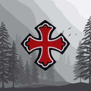 May include: Red embroidered cross patch with a white outline and black backing. The cross has a textured surface.