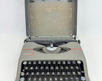 Vintage Portable Typewriter – Hermes Baby (Swiss Made)