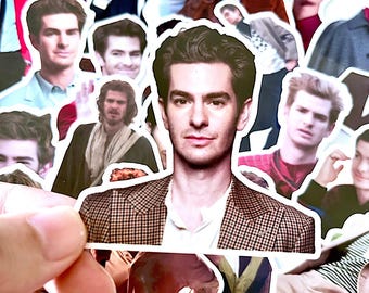 May include: A collection of stickers featuring various images of a man in different poses and outfits. The stickers are of different sizes and shapes, with a white border around each image. The man is wearing a brown plaid blazer in one of the images.