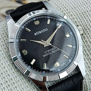 Reloj mecánico de cuerda manual para caballero Atlantic Vintage, fabricado en Suiza / Esfera negra con efecto rayos de sol, caja de acero, 17 joyas, restaurado. Ideal como regalo para él. 270-15