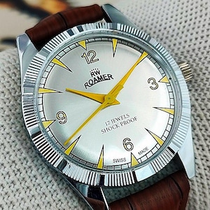 Reloj mecánico vintage Roamer de cuerda manual para caballero, fabricado en Suiza / Esfera plateada, caja de acero estriada, 17 joyas, restaurado. Ideal como regalo para él. Modelo 310-17