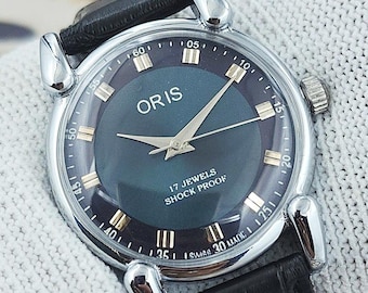 Vintage Swiss Made handopwindbaar mechanisch herenhorloge blauwe wijzerplaat Teardrop lugs 17 juwelen roestvrij staal gerenoveerd cadeau voor hem 510-14