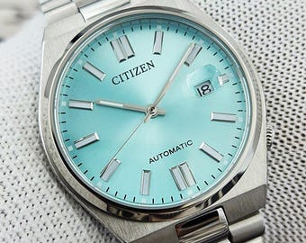 Zegarek automatyczny Citizen Tsuyosa NJ0151-88 M – niebieska tarcza 40 mm | Szkło szafirowe | Stal nierdzewna | Nieużywany, bez pudełka i dokumentów