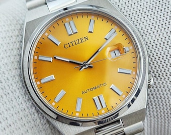 Citizen Tsuyosa NJ0150-56Z Automatic Watch – 40mm Yellow Dial | Sapphire Crystal | Stainless Steel | Unused No Box Papers