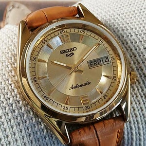 vintage refurbished Seiko 5 automatic 7009A japan mens wrist watch yellow dial exhibition back gold plated case gift for men for him 100-14