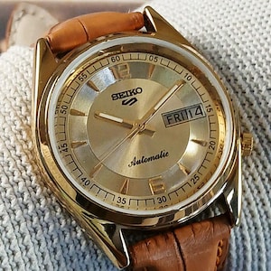 vintage refurbished Seiko 5 automatic 7009A japan mens wrist watch yellow dial exhibition back gold plated case gift for men for him 100-09