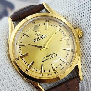 Reloj mecánico vintage Roamer de cuerda manual para hombre, fabricado en Suiza, esfera amarilla, asas curvas, 17 joyas, chapado en oro, restaurado. Regalo para él. 230-18
