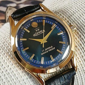 Orologio da polso da uomo vintage Roamer Swiss Made a carica manuale, quadrante blu, anse curve, cassa placcata in oro, regalo per uomo - sk0122