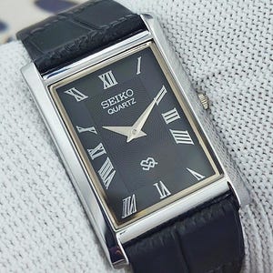 Vintage Seiko Slim Tank Quarz Japan Herren Armbanduhr Schwarzes Zifferblatt Geschenk für Ihn 2000-07