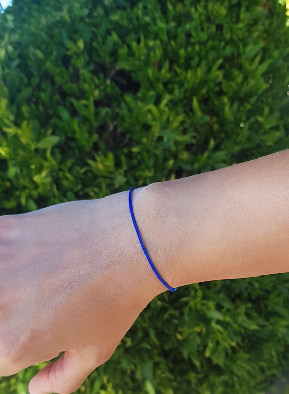 Blue thread bracelet sale