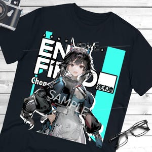 May include: Black t-shirt featuring a colorful anime-style illustration of a character with black hair and blue accents. The shirt has the text "ARKNIGHTS" and "ENFIFD" in white, with a turquoise stripe. The word "SAMPLE" is also visible.