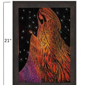 May include: A framed artwork featuring a woman in a colorful, patterned robe. The woman is depicted with a flowing robe with shades of orange, yellow, and purple. The background is a dark blue with white stars.