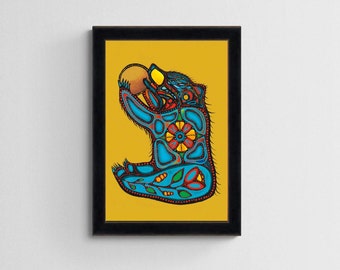May include: A framed print of a stylized blue bear holding a yellow circle. The bear is decorated with geometric patterns in red, yellow, orange, and green.