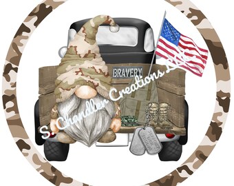 May include: A camouflage gnome sitting in the back of a black pickup truck with a wooden bed. The truck has a "Bravery" license plate and is decorated with an American flag, military boots, and dog tags that read "Support Our Troops". The gnome is wearing a camouflage hat and has a white beard. The image is surrounded by a camouflage pattern.