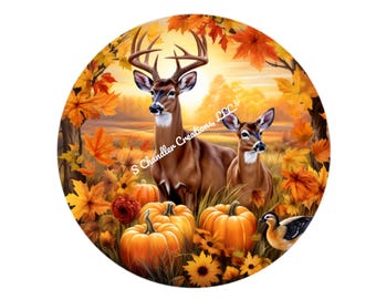 May include: A round, colorful illustration of two deer standing in a field of fall foliage. The deer are brown and white with large antlers. The background is a vibrant orange, yellow, and red with pumpkins and leaves. The text "S Chandler Creations LLC" is visible in the background.
