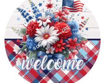 May include: A round welcome sign with a red, white, and blue plaid background. A bouquet of red, white, and blue flowers with a blue ribbon is in the center of the sign. The words "welcome" are written in white on the sign.
