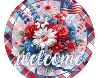 May include: A round welcome sign with a red, white, and blue plaid background. A bouquet of red, white, and blue flowers with an American flag is in the center of the sign. The word "welcome" is written in white letters on a blue ribbon.