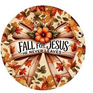 May include: Round decorative sign with a fall theme. The sign features a cream-colored ribbon with the text "FALL FOR JESUS - HE NEVER LEAVES". The ribbon is adorned with orange fall leaves and a central orange flower. The background is filled with autumn leaves.