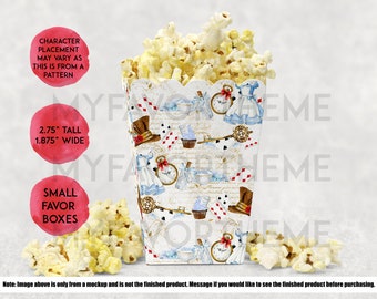 May include: Small favour boxes with a whimsical Alice in Wonderland theme. The boxes are 2.75 inches tall and 1.875 inches wide. The boxes are decorated with a white background and colourful illustrations of Alice, the Mad Hatter, a pocket watch, a key, and cupcakes.