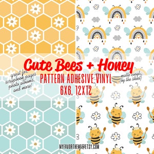 May include: Two digital paper patterns featuring cute bees and honey. The first pattern is a honeycomb design with white daisies. The second pattern features bees with honey sticks, rainbows, and white daisies on a white background. The text "Cute Bees + Honey" is displayed in the center of the image. The text "PATTERN ADHESIVE VINYL" is displayed below the title. The text "6X6, 12X12" is displayed below the pattern name. The text "matte vinyl (by the sheet)" is displayed in the upper right corner of the image.