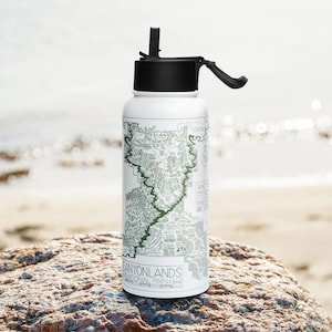 Botella de agua con mapa de parques nacionales