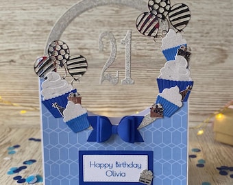 Tarjeta de cumpleaños personalizada, en tonos azules y plateados, con cualquier edad y nombre.