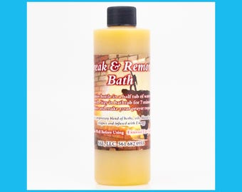 May include: A yellow bottle with a red and black label that reads "Break & Remove Bath". The label also includes instructions for use and a phone number for SSE, LLC.