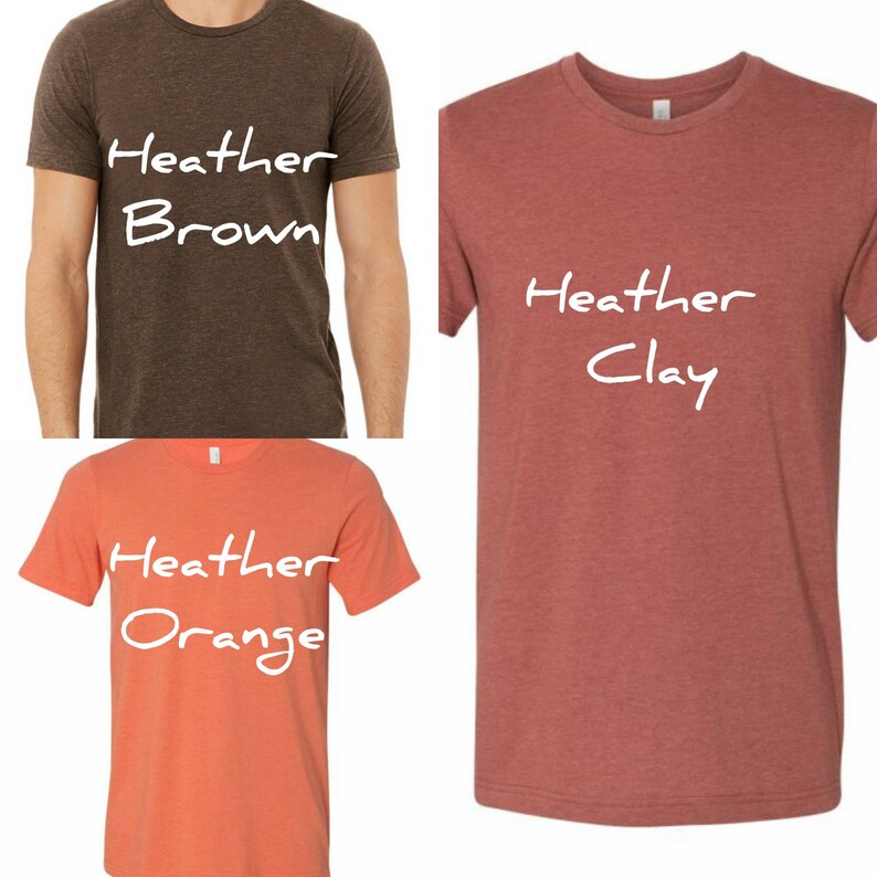 May include: Three t-shirts in different colors: heather brown, heather clay, and heather orange. Each shirt has the word "Heather" written on it, followed by the color of the shirt.