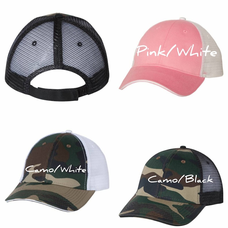 May include: Four different styles of baseball caps with mesh back panels. The caps are in black, pink, camo with white trim, and camo with black trim. The text on the caps reads "Pink/White", "Camo/White", and "Camo/Black".