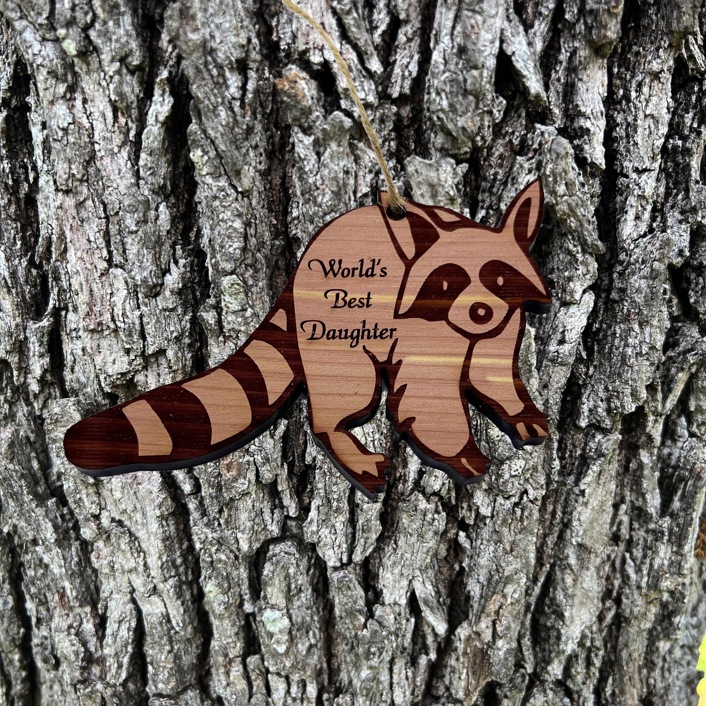 Raccoon Worlds Best Daughter - Cedar Ornament Raccoon Worlds Best Daughter - Cedar Ornament