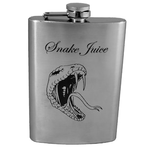 May include: A silver stainless steel flask with a black snake graphic and the text "Snake Juice" engraved on the front.