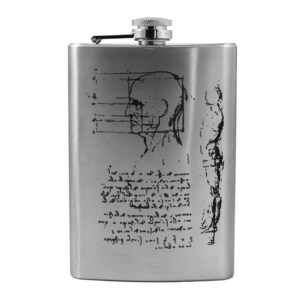 May include: A silver stainless steel hip flask with a black and white image of a human head and body with anatomical markings and text. The flask has a screw-on cap.