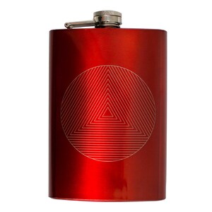May include: A red metal flask with a silver top and a geometric design of a circle with a triangle inside.