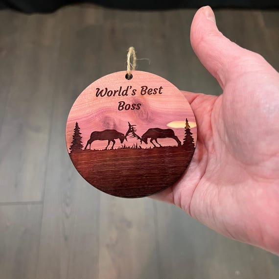 Winter Wolf Worlds Best Boss - cedar ornament Winter Wolf Worlds Best Boss - cedar ornament