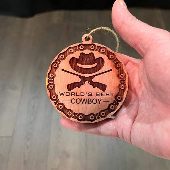 Worlds Best Cowboy Rifles and chains - Cedar Ornament Worlds Best Cowboy Rifles and chains - Cedar Ornament