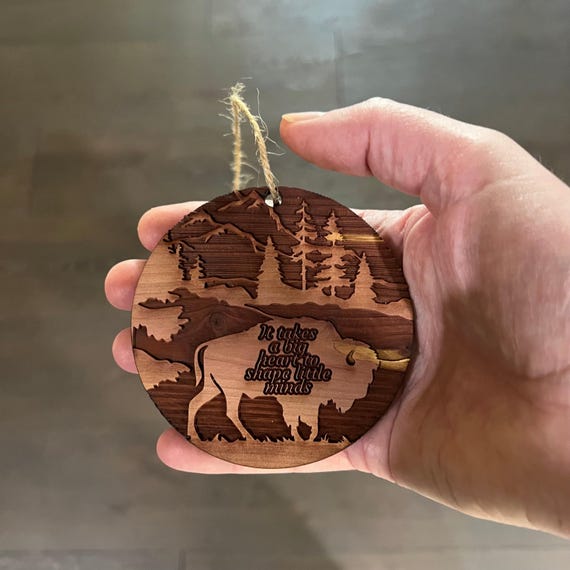 BISON it takes a big heart to shape little minds - Cedar Ornament BISON it takes a big heart to shape little minds - Cedar Ornament