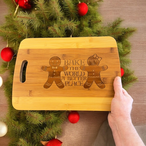 Bake the World a Better Place - Cutting Board 14''x9.5''x.5'' Bamboo Bake the World a Better Place - Cutting Board 14''x9.5''x.5'' Bamboo